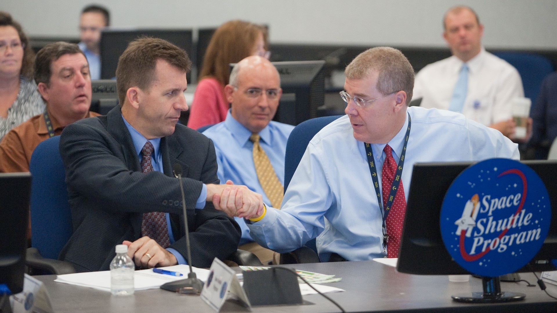 Hartman attending the final meeting of the Joint Mission Management Team between the Space Shuttle and International Space Station Programs. 